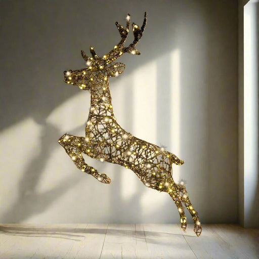 LED Twinkling PVC Rattan Leaping Reindeer – 240 Vintage Gold LEDs, 150cm - Christmas Factory